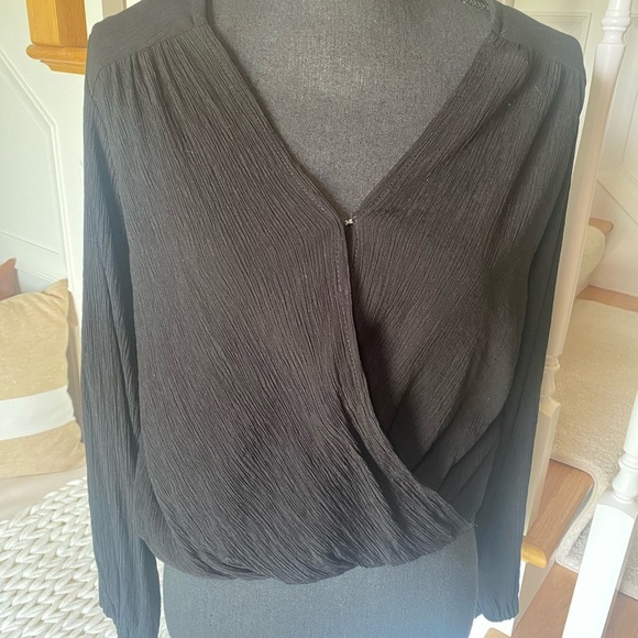 NWOT Free People size XS Black long sleeve faux wrap top. Hook and eye closeure - Picture 2 of 4